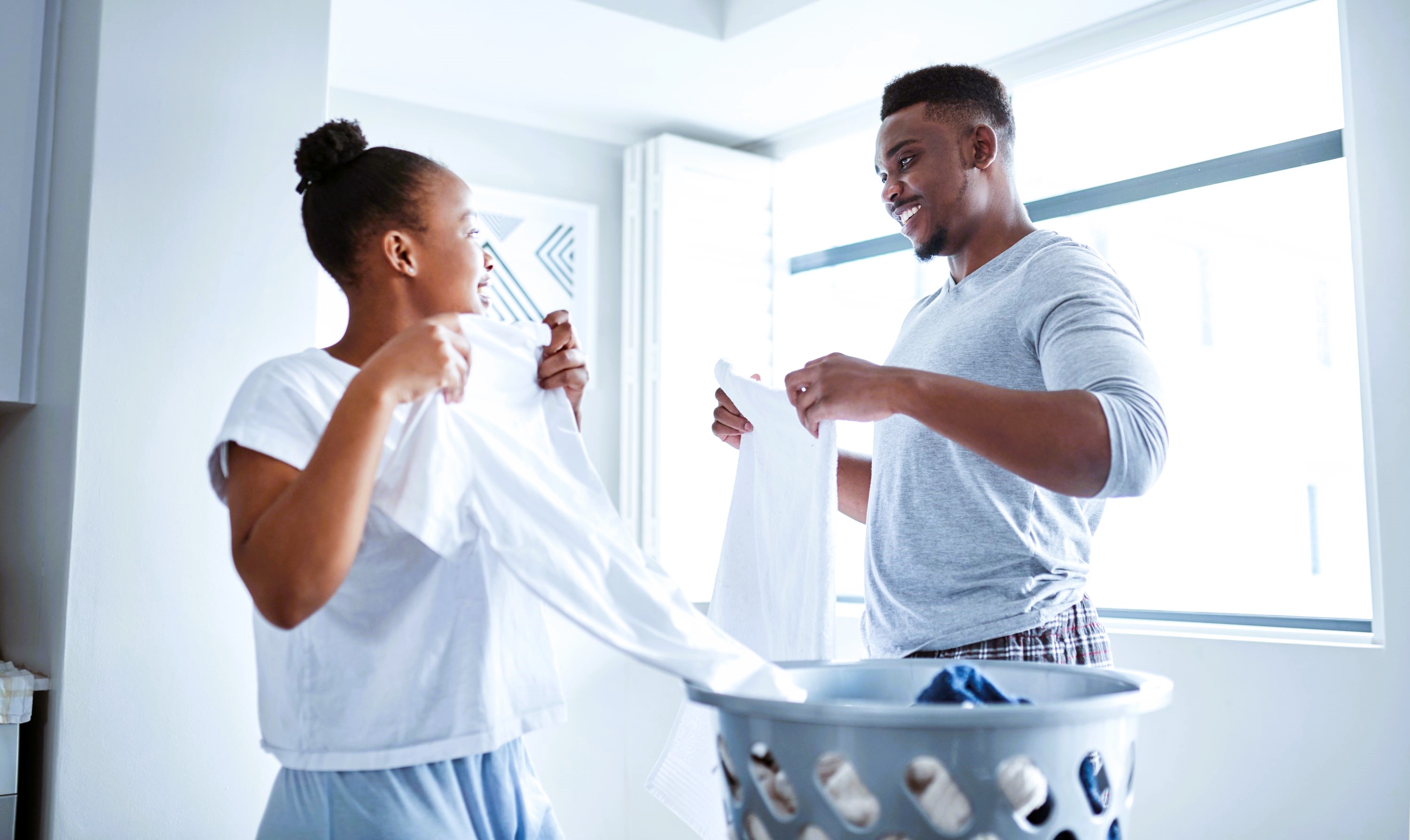 Couple Doing Laundry Cool Shutterstock 2146083771